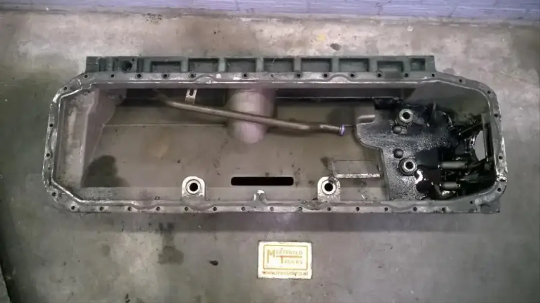 Volvo Tussen carterpan DH12